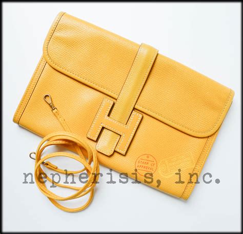 hermes jige with strap.